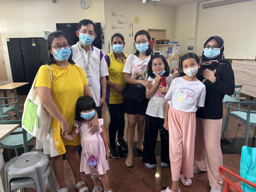 Kids sharing soft toys at Lentor Residence