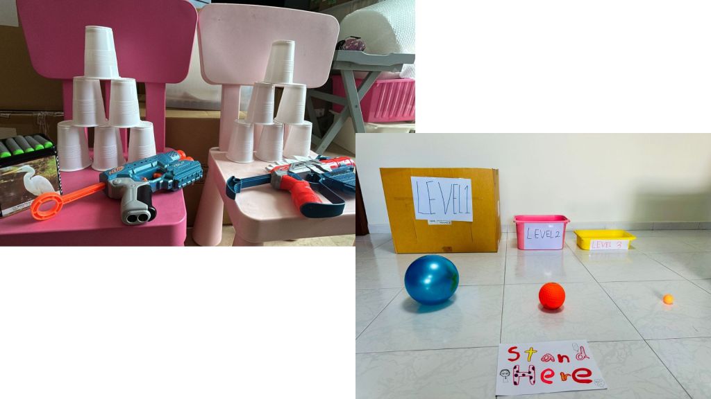 Game stations, kid-made and tested: Alby’s ball tossing, plus Olivia, Emily, and Natalie’s Nerf target shooting.